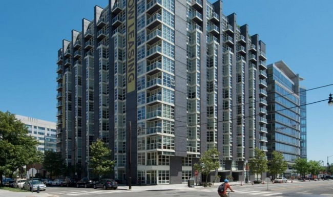 A perfect fit for the whole family a tall building with many windows